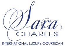 Sara Charles, Traveling Brunette Girlfriend Logo